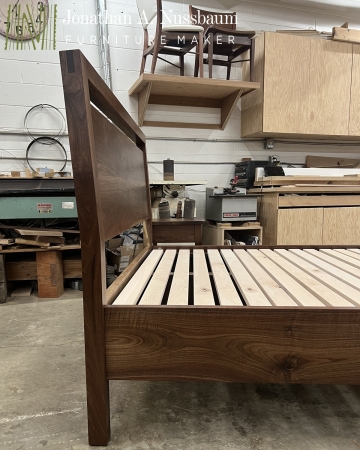 Walnut-Concealed-Storage-Bed-with-angled-headboard