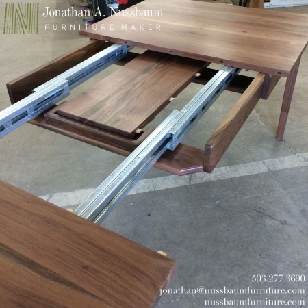 Western Walnut Finn Juhl inspired Extension Dining Table with self storing leaf